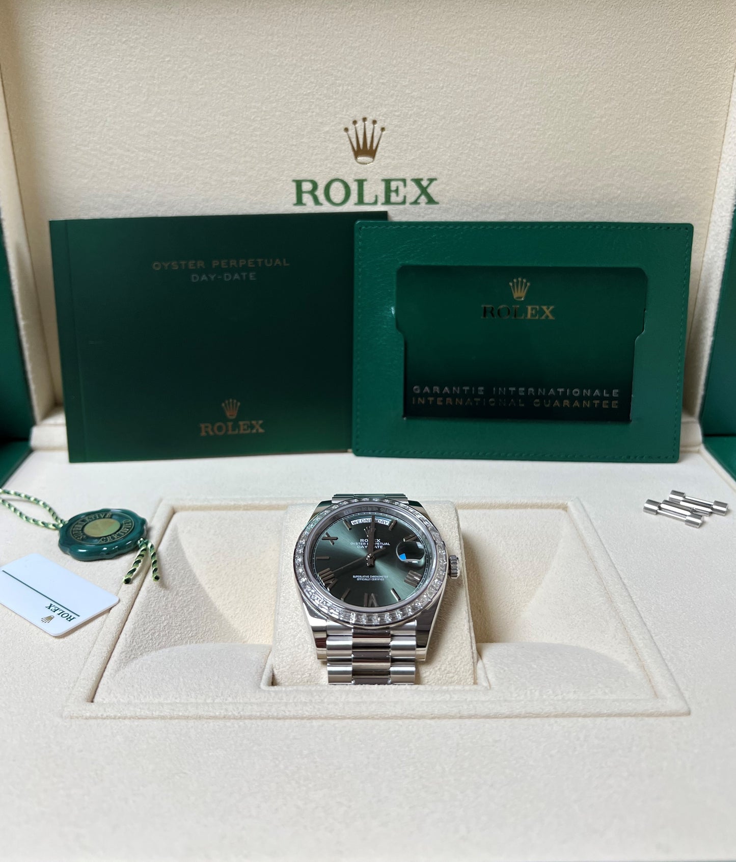 Rolex Day-Date 40 Platinum 2022 Olive Green Dial Diamond Baguette Bezel 228396TBR