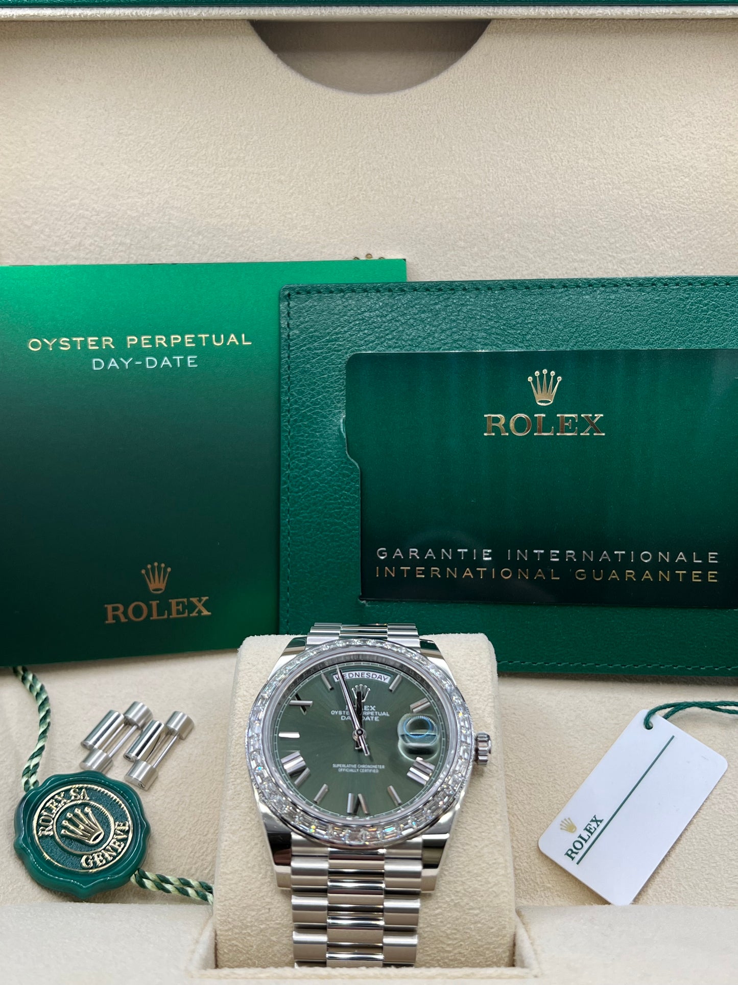 Rolex Day-Date 40 Platinum 2022 Olive Green Dial Diamond Baguette Bezel 228396TBR